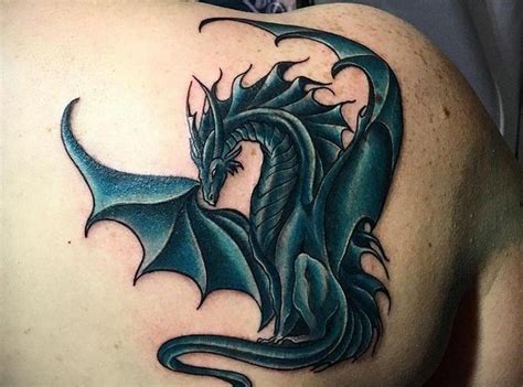 Что означает дракон тату